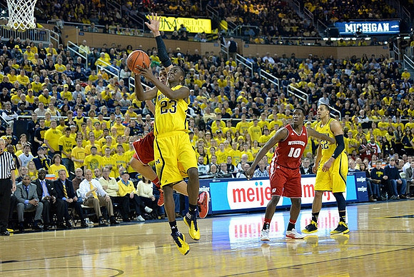 Caris LeVert (23) and Jordan Morgan (52)