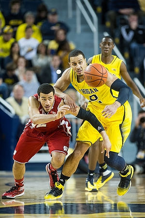 Jordan Morgan (52) and Caris LeVert (23)