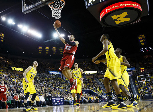 Nik Stauskas (11), Jordan Morgan (52), Zak Irvin (21), and Caris LeVert (23)