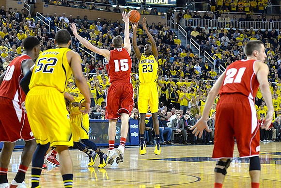 Jordan Morgan (52) and Caris LeVert (23)