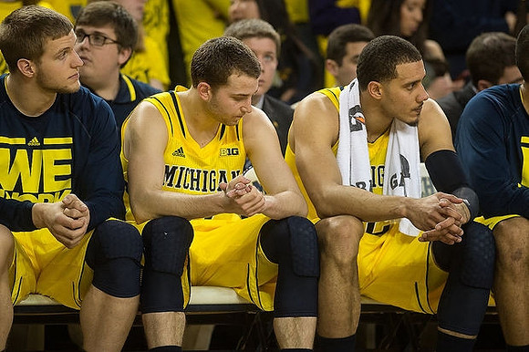 Max Bielfeldt (44), Nik Stauskas (11), and Jordan Morgan (52)