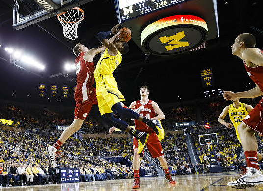 Glenn Robinson III (1) and Jordan Morgan (52)