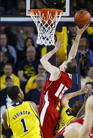 Glenn Robinson III (1) and Spike Albrecht (2)