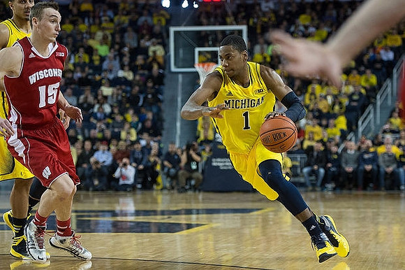 Glenn Robinson III (1) and Jordan Morgan (52)
