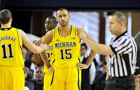 Nik Stauskas (11), Caris LeVert (23), and Jon Horford (15)