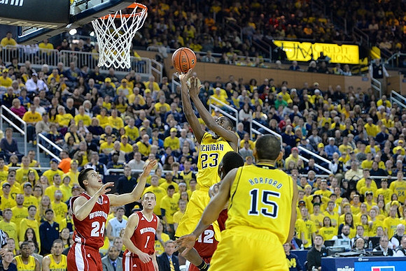 Caris LeVert (23) and Jon Horford (15)