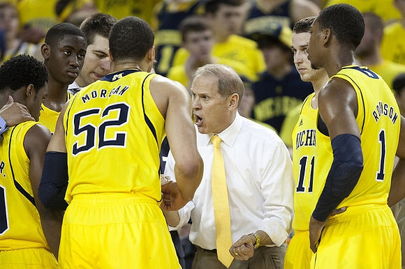 Derrick Walton Jr. (10), Caris LeVert (23), Mitch McGary (4), John Beilein, Nik Stauskas (11), and Glenn Robinson III (1)
