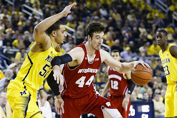 Jordan Morgan (52) and Caris LeVert (23)