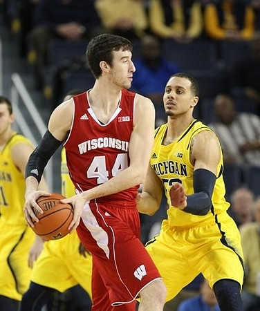 Nik Stauskas (11) and Jordan Morgan (52)