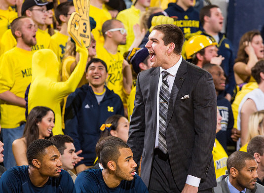 Zak Irvin (21), Jon Horford (15), Mitch McGary (4), and LaVall Jordan
