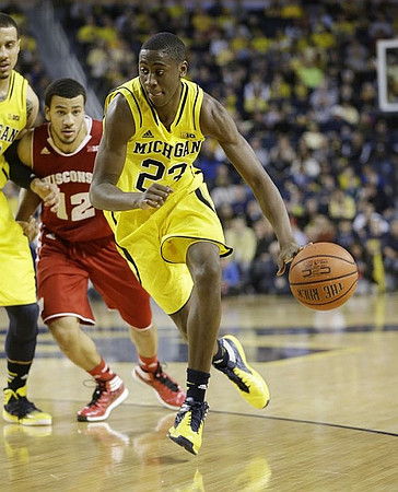 Jordan Morgan (52) and Caris LeVert (23)