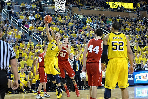 Nik Stauskas (11) and Jordan Morgan (52)