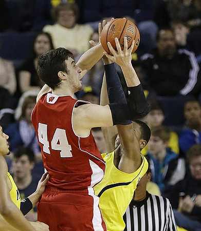 Jordan Morgan (52) and Glenn Robinson III (1)