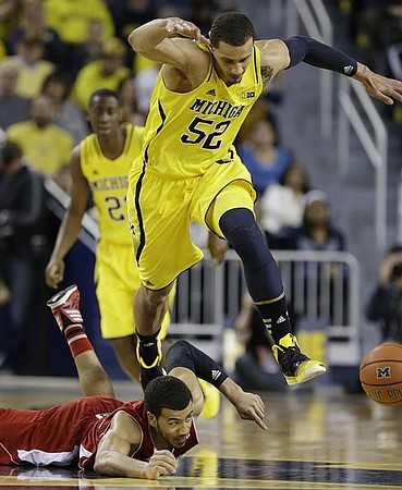 Caris LeVert (23) and Jordan Morgan (52)