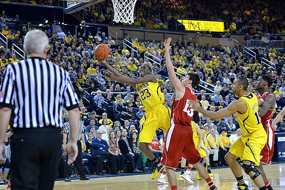 Caris LeVert (23) and Jon Horford (15)