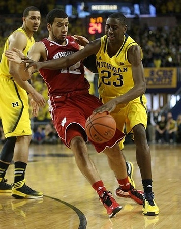 Jordan Morgan (52) and Caris LeVert (23)