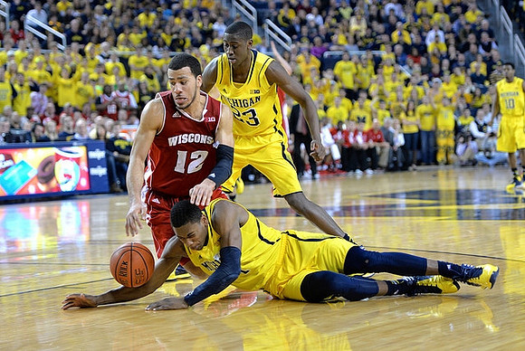 Glenn Robinson III (1) and Caris LeVert (23)