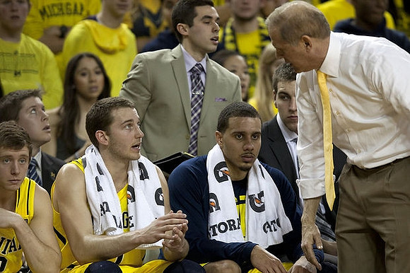 Spike Albrecht (2), Nik Stauskas (11), Jordan Morgan (52), and John Beilein
