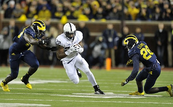 Jourdan Lewis (26) and Mario Ojemudia (53)