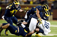 Jake Ryan (47) and Defense