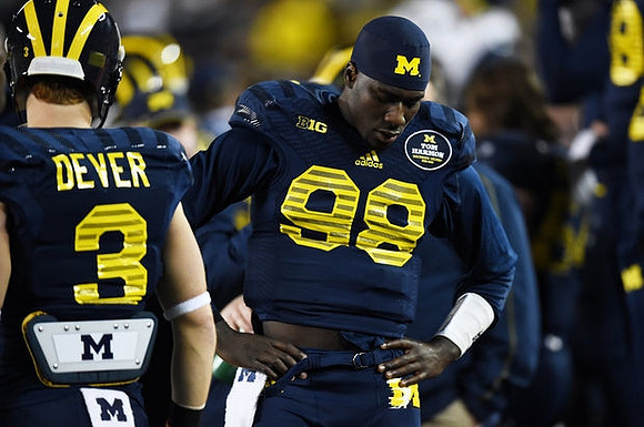 Bo Dever (3) and Devin Gardner (98)