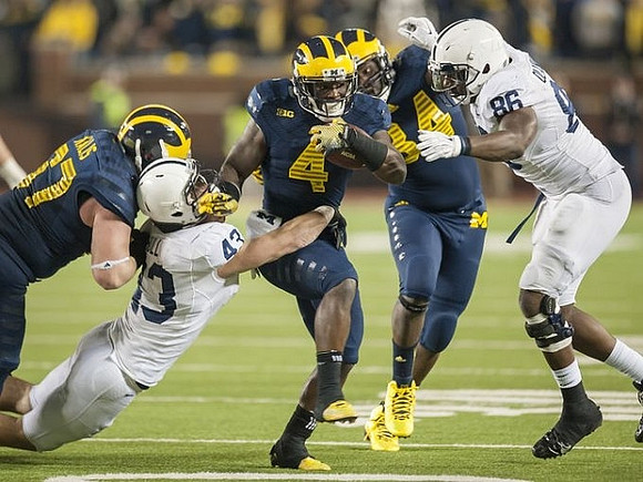 Kyle Kalis (67), De'Veon Smith (4), and A.J. Williams (84)