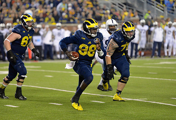 Kyle Kalis (67), Devin Gardner (98), and Ben Braden (71)