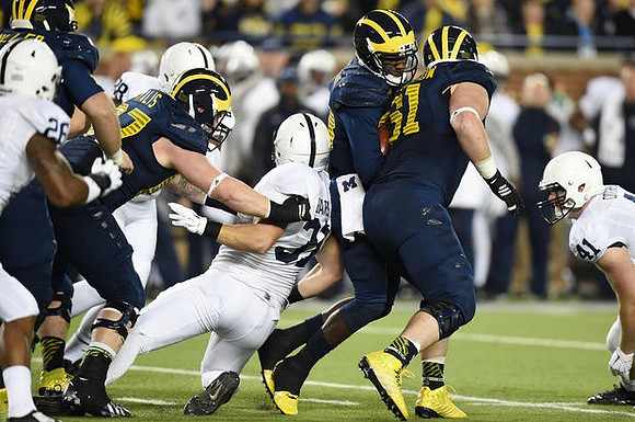 Kyle Kalis (67), Devin Gardner (98), and Graham Glasgow (61)