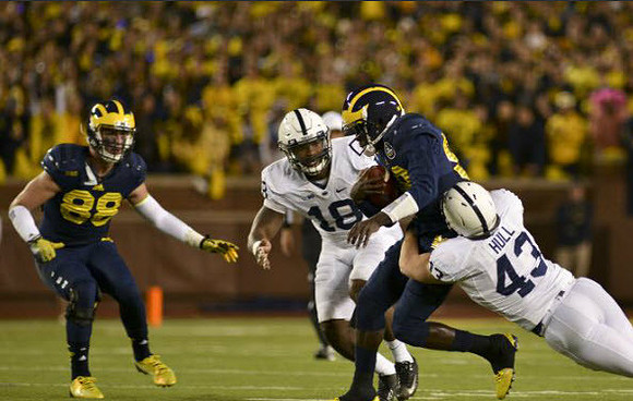 Jake Butt (88) and Devin Gardner (98)