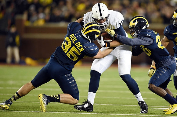 Joe Bolden (35) and Jourdan Lewis (26)