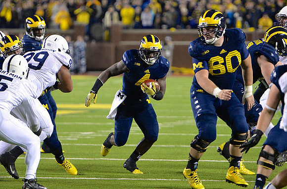 De'Veon Smith (4) and Jack Miller (60)