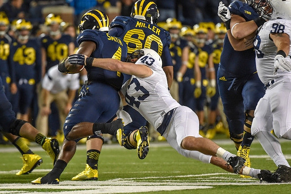 De'Veon Smith (4) and Jack Miller (60)
