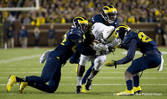 Blake Countess (2) and Jourdan Lewis (26)