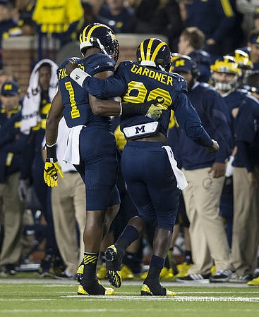 Devin Funchess (1) and Devin Gardner (98)