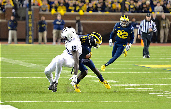 Jourdan Lewis (26) and Jarrod Wilson (22)