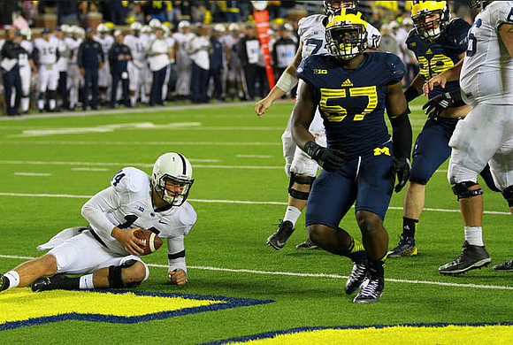 Frank Clark (57) and Matthew Godin (99)