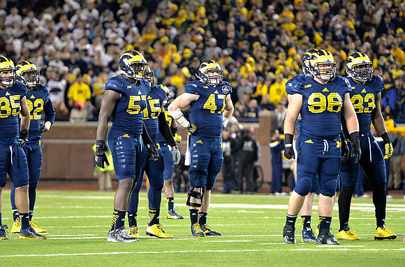Joe Bolden (35), Jarrod Wilson (22), Frank Clark (57), James Ross (15), Jake Ryan (47), Ryan Glasgow (96), and Taco Charlton (33)