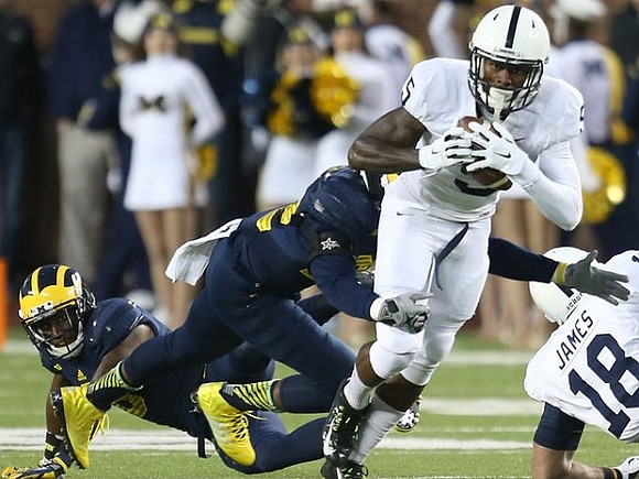 Jarrod Wilson (22) and Raymon Taylor (6)