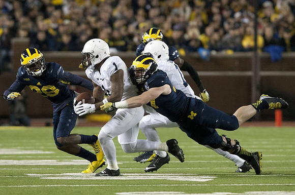 Jake Ryan (47) and Jourdan Lewis (26)