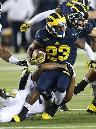 Dennis Norfleet (23) and Mike McCray (9)