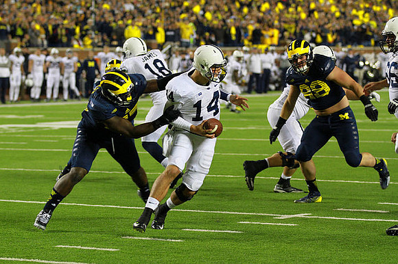 Frank Clark (57) and Matthew Godin (99)