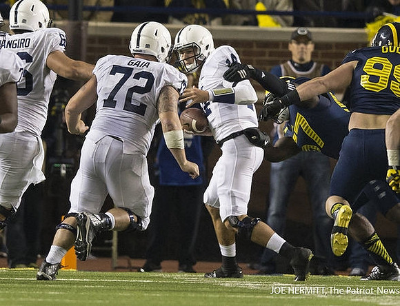 Frank Clark (57) and Matthew Godin (99)