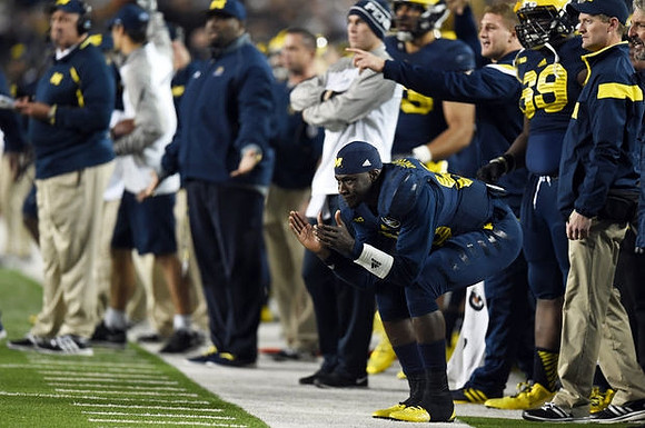 Devin Gardner (98) and Willie Henry (69)