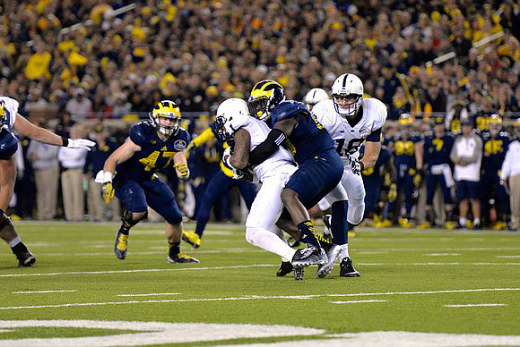 Jake Ryan (47) and Frank Clark (57)