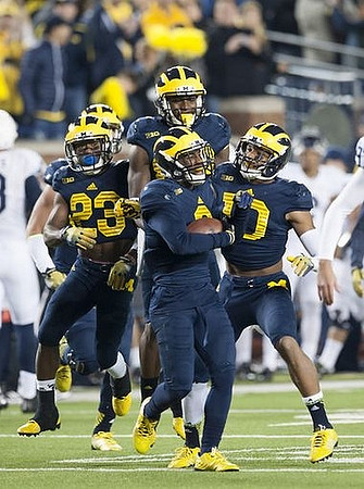 Dennis Norfleet (23), Blake Countess (2), and Da'Mario Jones (10)