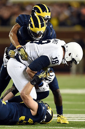 Joe Bolden (35) and Defense