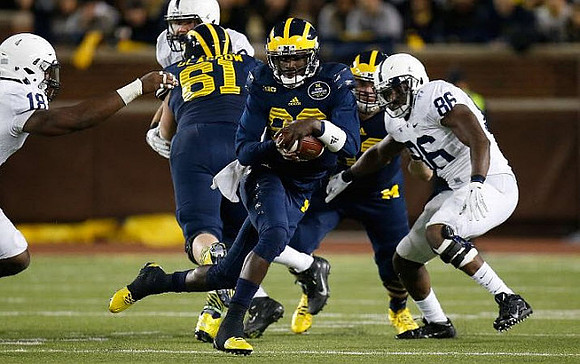 Graham Glasgow (61) and Devin Gardner (98)