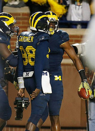 Devin Gardner (98) and Devin Funchess (1)