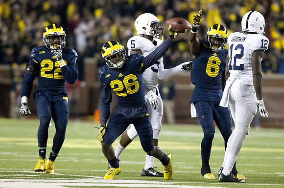 Jarrod Wilson (22), Jourdan Lewis (26), and Raymon Taylor (6)