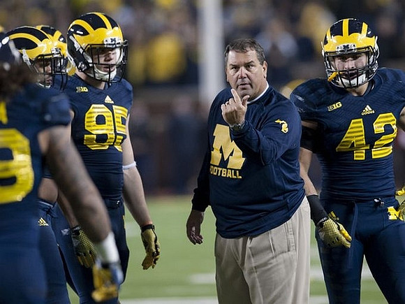 Brady Hoke, Michael Jocz (95), and Ben Gedeon (42)